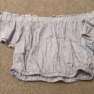 light blue off the shoulder ruffle shirt